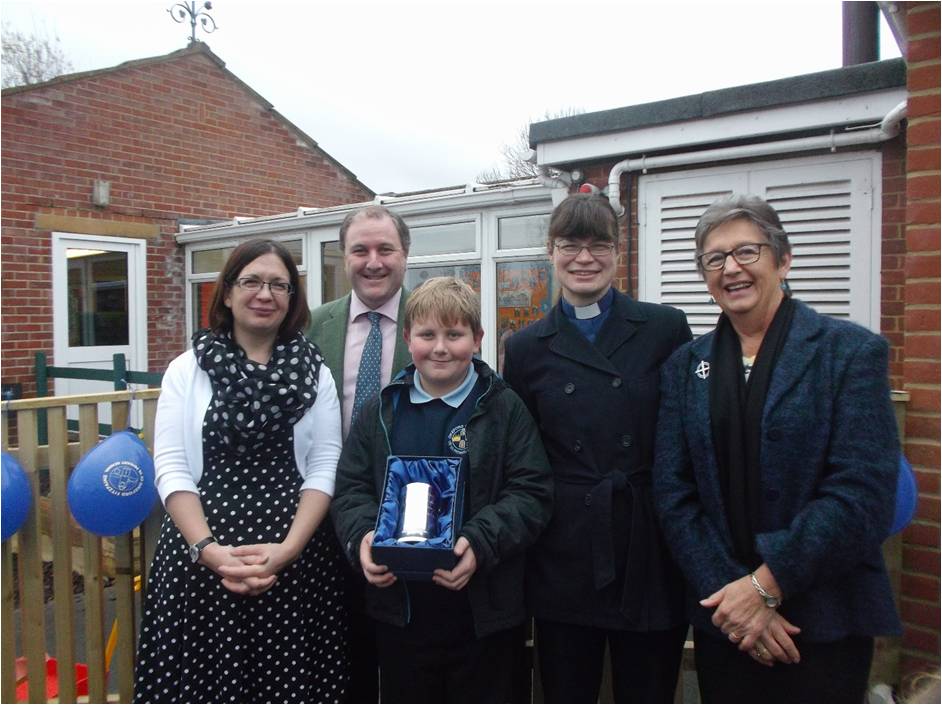 Receiving a thank you gift, L-R Miss Alison Chant, Mr Simon Hoare MP, the Revd Lydia Cook and Mrs Sue Le Riche