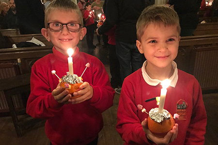 What's missing from the Christingle- they are lit