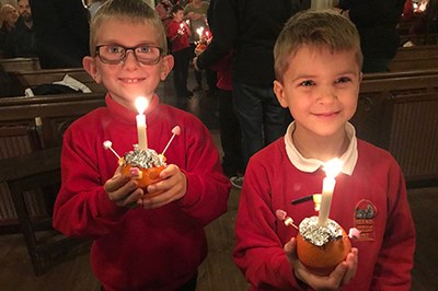 What's missing from the Christingle- they are lit