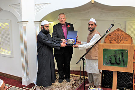 Bishop Nicholas receives an inscribed plaque