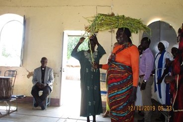 Praying for Peace- inside the church in Dilling, Sudan