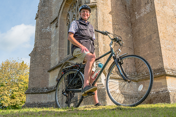 Ride+Stride, 2020-style- The Revd Chris Burdon with his bike at All Saints’ Church in Marden- Photo by Gerry Lynch