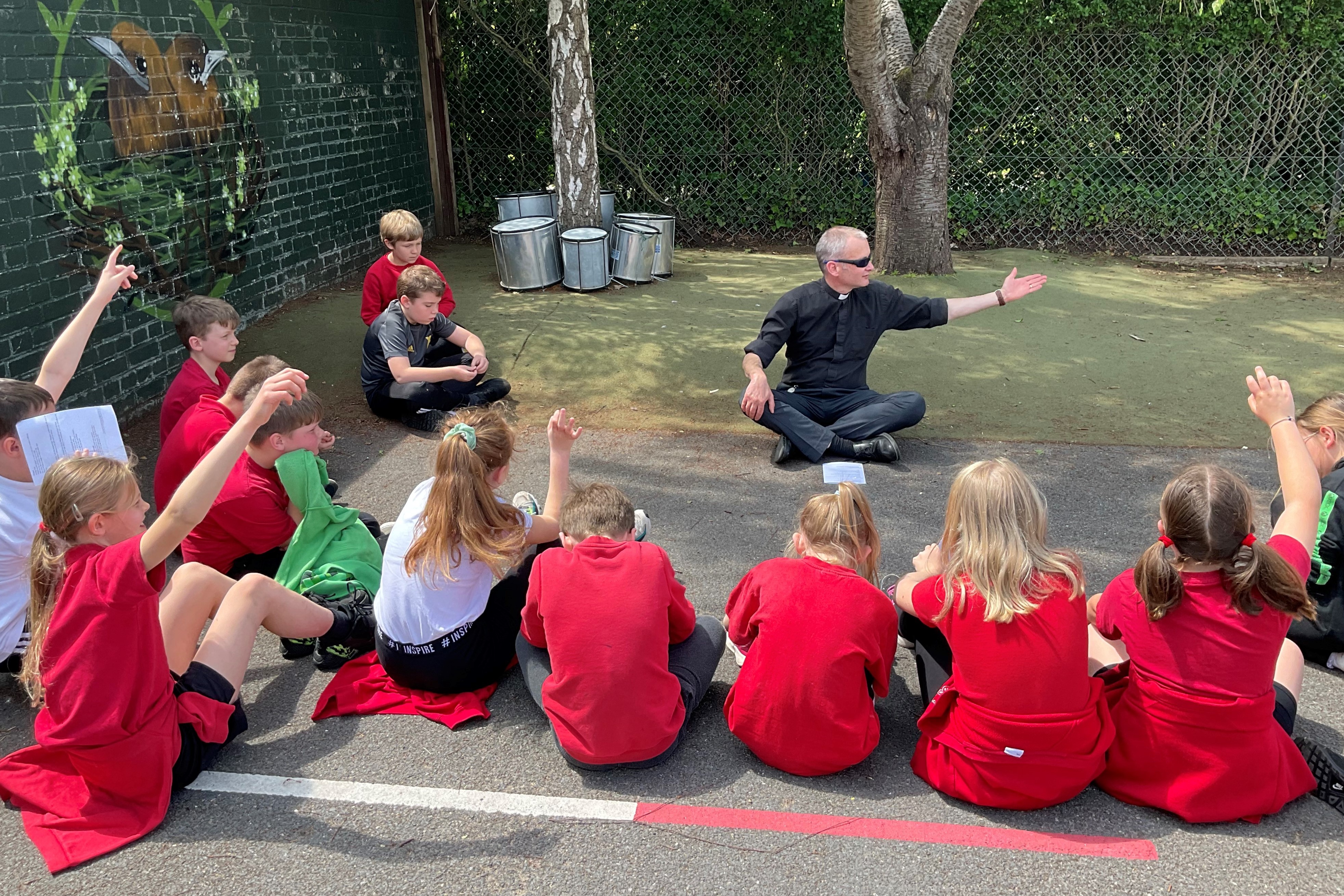 Tackling food poverty- Vicar Andy Muckle with pupils