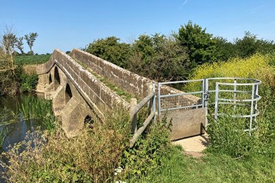 Walking with purpose- Packhorse Bridge at Broughton Gifford