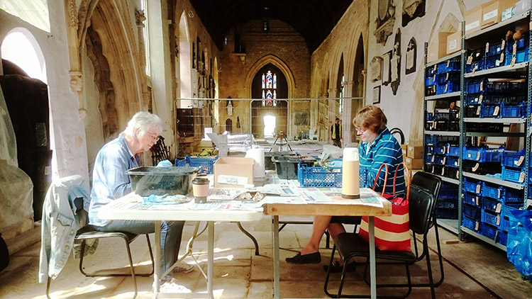 Volunteers help at recording Holy Trinity Bradford archaeological finds.jpg