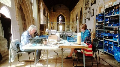 Volunteers help at recording Holy Trinity Bradford archaeological finds.jpg