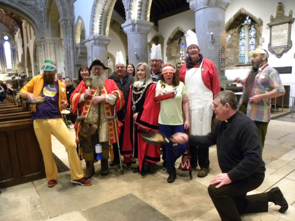 Pancake racing raises Minster funds 